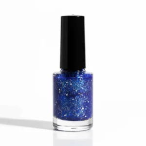 A glass bottle containing a deep, royal blue glitter nail polish against a white background.
