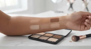 Arm swatches of a contour palette for beginners displaying various shades for different skin tones.